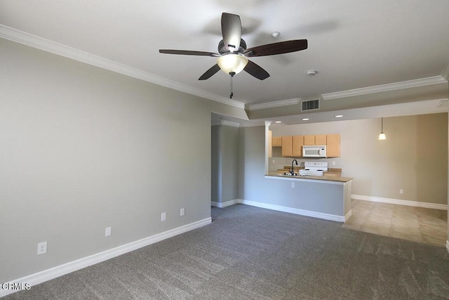 unfurnished living room featuring carpet flooring, ceiling fan, crown molding, and sink