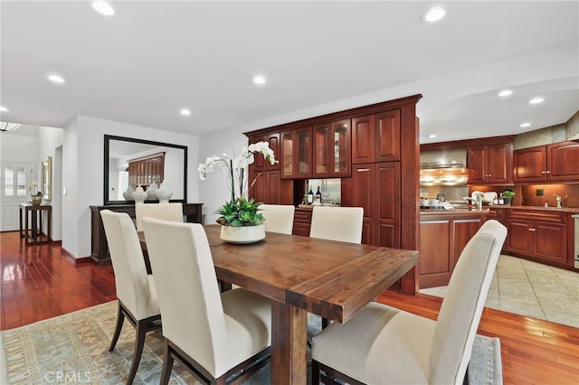 dining area with light hardwood / wood-style flooring