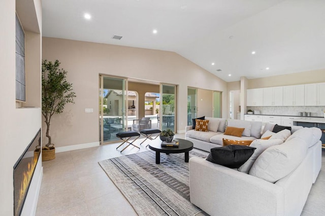 tiled living room with vaulted ceiling