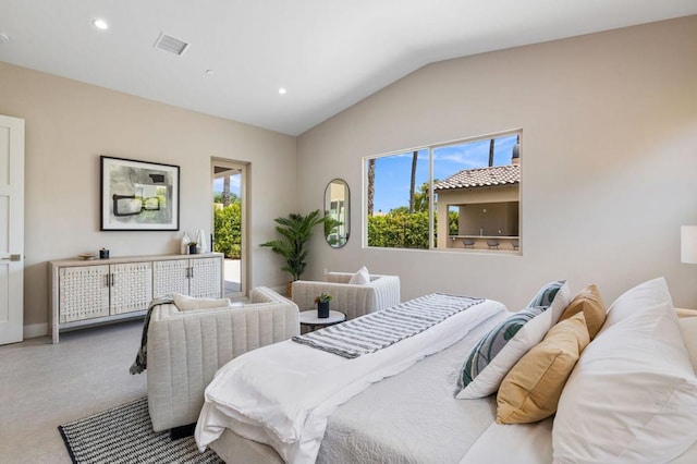 carpeted bedroom featuring vaulted ceiling