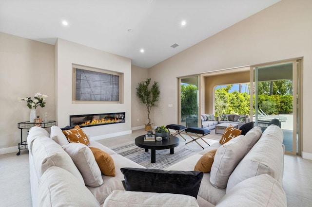 living room with vaulted ceiling