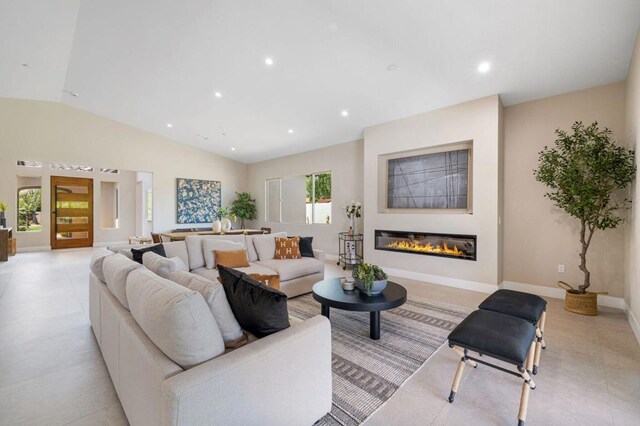 living room with lofted ceiling