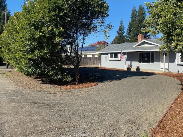 1954 Durham Dayton, Durham, CA 95938 - view of front facade with stucco siding and a chimney