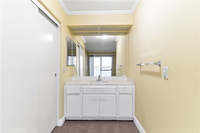 bathroom with vanity and crown molding