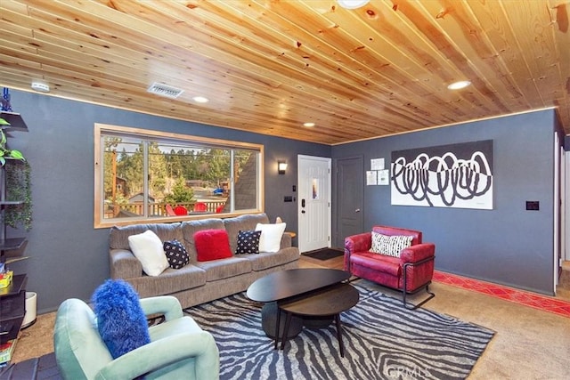 carpeted living room with wooden ceiling