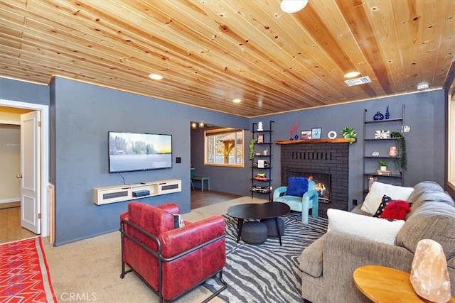 carpeted living room featuring wooden ceiling and a brick fireplace