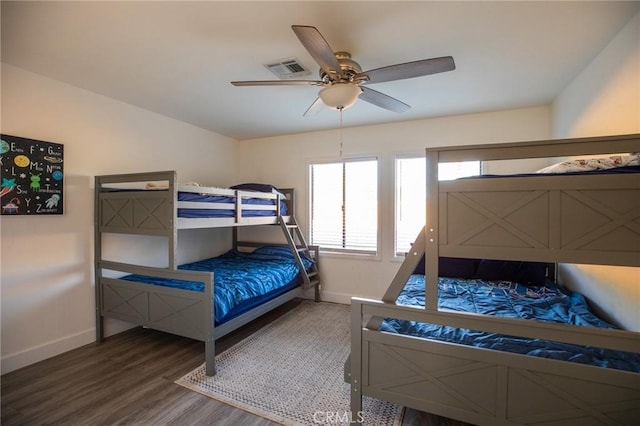 bedroom featuring ceiling fan and wood-type flooring