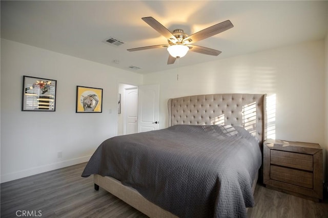 bedroom featuring ceiling fan and dark wood-type flooring