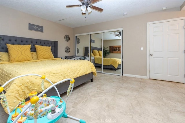 bedroom featuring a closet and ceiling fan