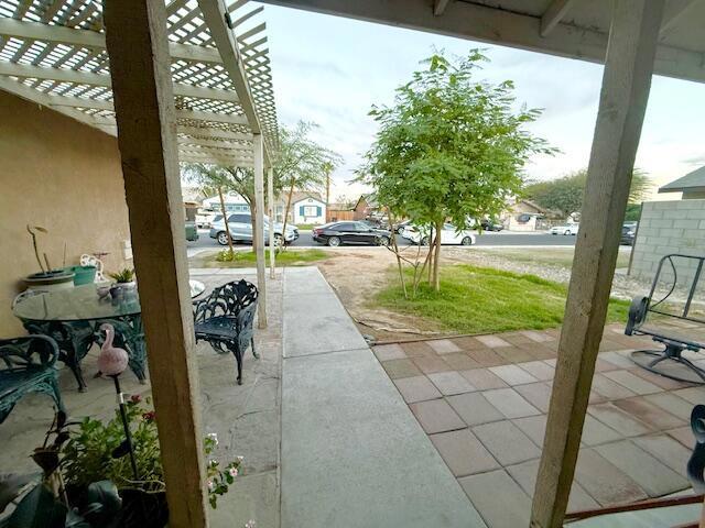 view of patio featuring a pergola