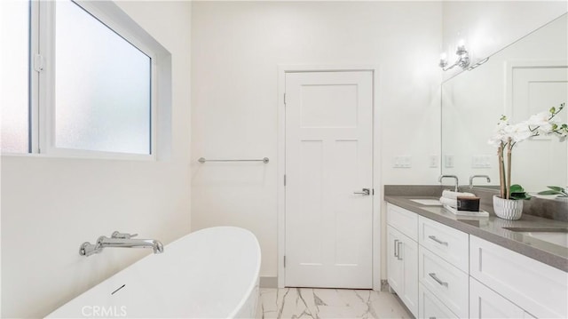 bathroom featuring a bathtub and vanity