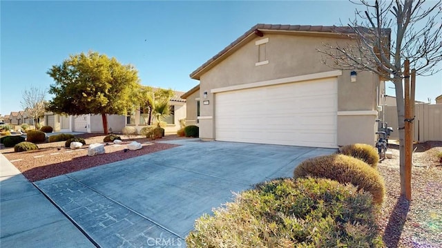 view of side of home featuring a garage