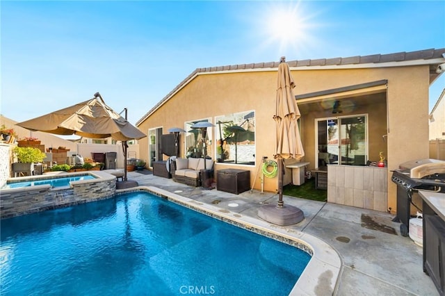 rear view of property with a patio area, fence, an outdoor living space, and stucco siding