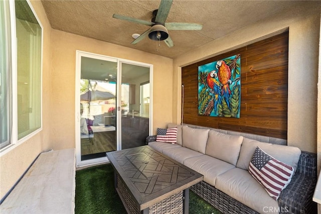 view of patio / terrace featuring an outdoor living space and a ceiling fan