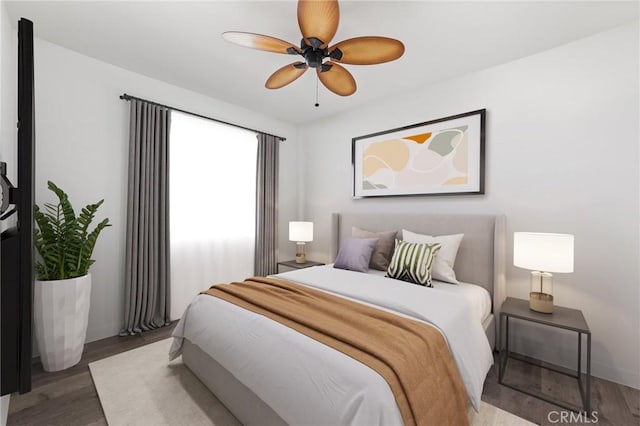 bedroom featuring wood finished floors