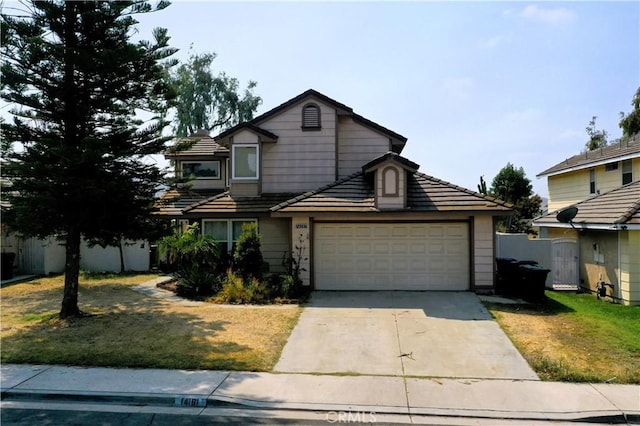 14181 Southwood Dr, Fontana, CA 92337 - traditional home with driveway, a garage, and a tiled roof