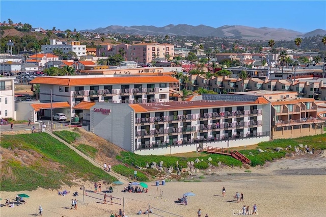 birds eye view of property featuring a mountain view