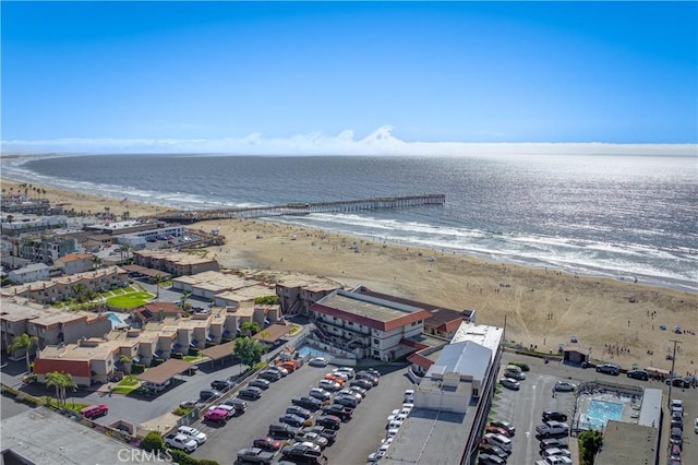 aerial view with a view of the beach and a water view