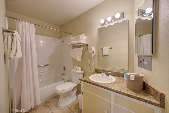 full bathroom featuring tile patterned floors, shower / tub combo with curtain, vanity, and toilet