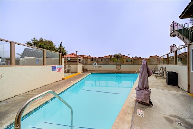 view of pool with a patio area