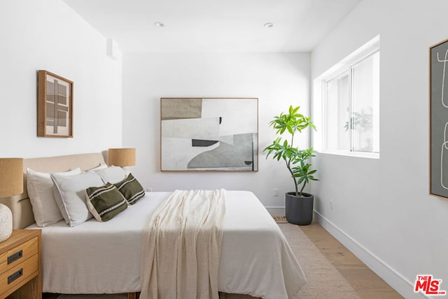 bedroom featuring light hardwood / wood-style flooring