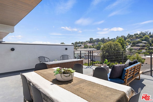 view of patio with a balcony