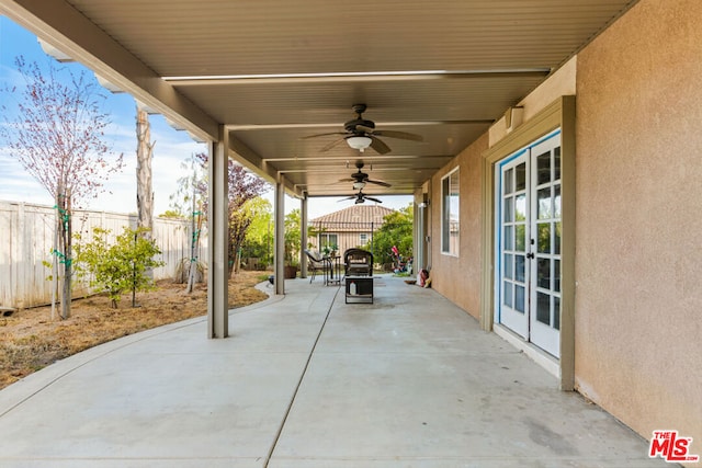 view of patio / terrace with ceiling fan and french doors