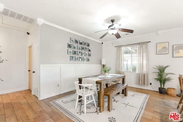 dining area featuring light hardwood / wood-style floors, ceiling fan, and ornamental molding