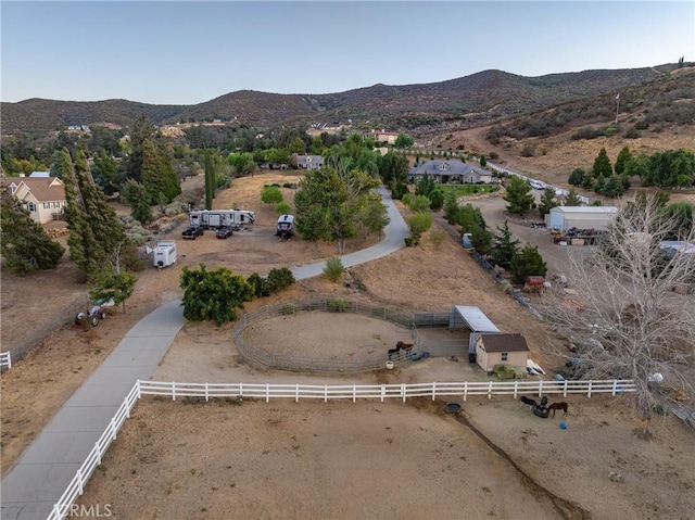 aerial view featuring a mountain view and a rural view