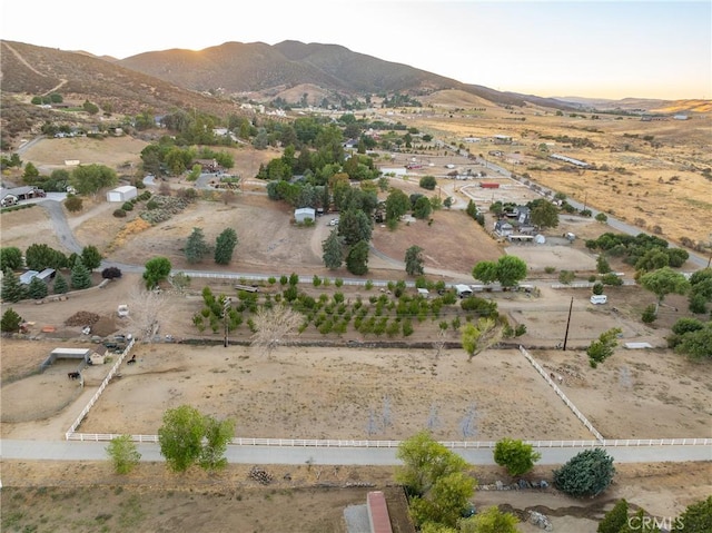 aerial view at dusk with a mountain view