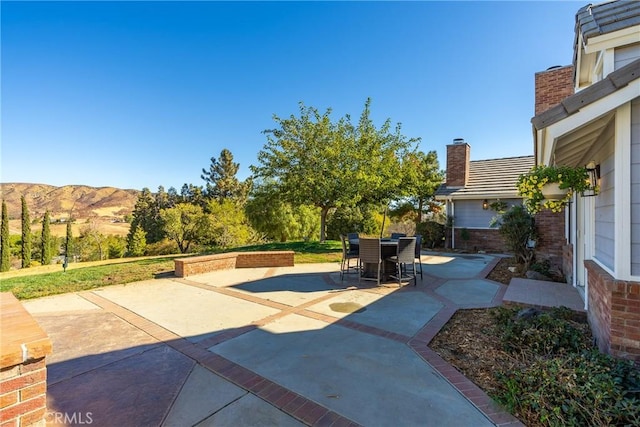 view of patio featuring a mountain view