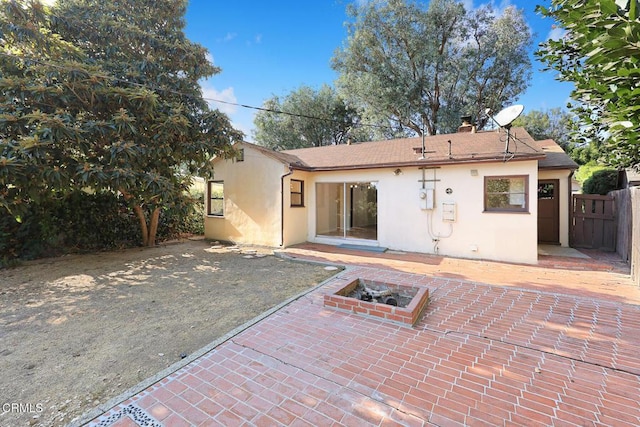 rear view of property with a patio