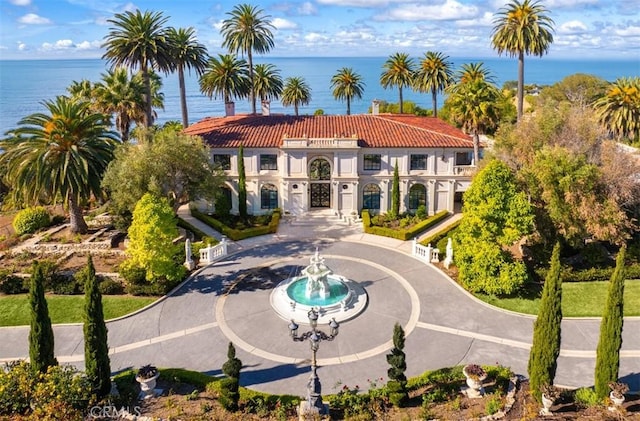 exterior space with a water view