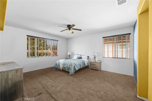 24809 Melrose Dr, Menifee, CA 92585 - carpeted bedroom with visible vents and ceiling fan