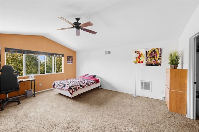 bedroom featuring carpet, vaulted ceiling, and ceiling fan