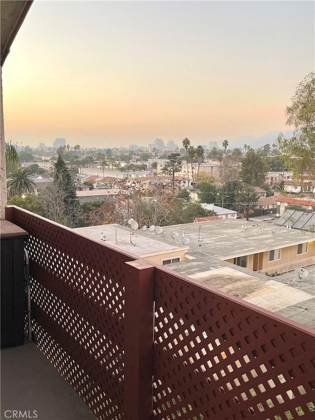 view of balcony at dusk