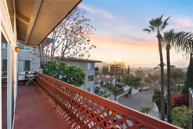 view of balcony at dusk