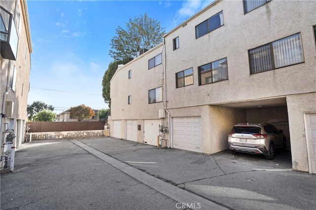 view of building exterior featuring a garage