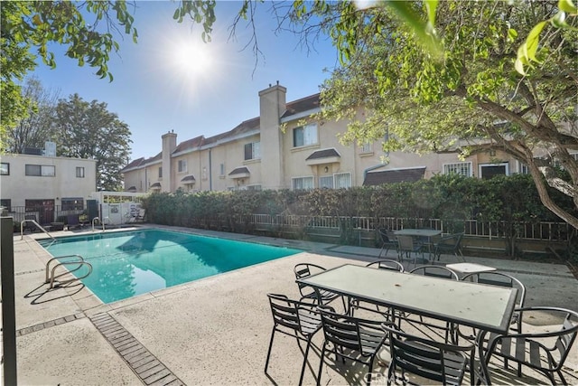 view of pool with a patio