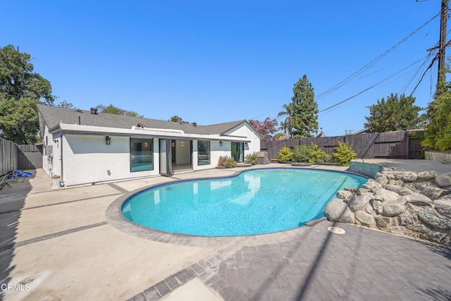 view of pool with a patio