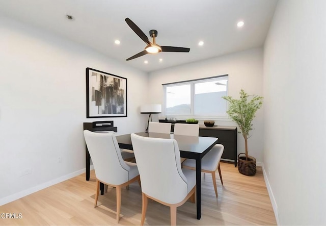 dining area featuring ceiling fan and light hardwood / wood-style floors