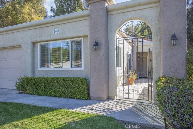 entrance to property featuring a garage