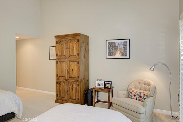 bedroom with light colored carpet