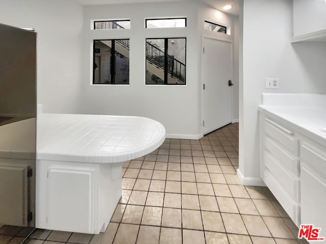 bathroom featuring tile patterned flooring