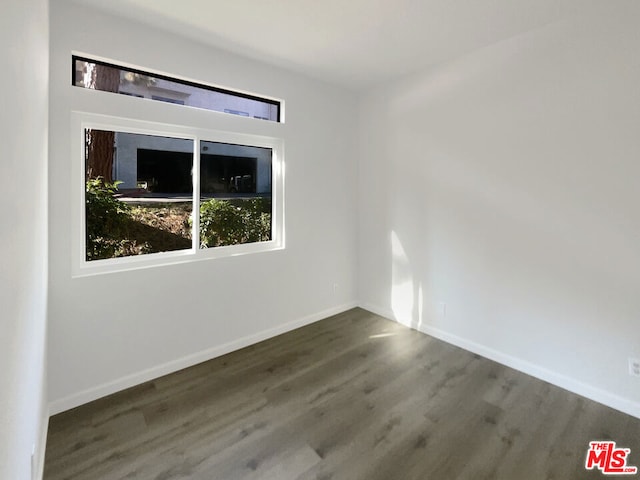 empty room featuring hardwood / wood-style floors