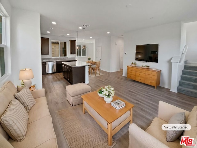 living room with dark hardwood / wood-style floors