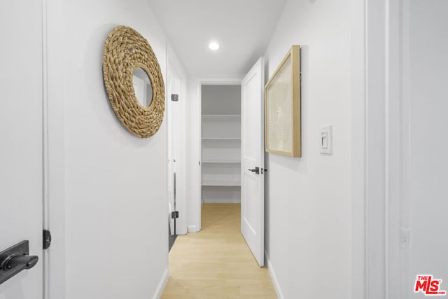 hallway featuring light wood-type flooring