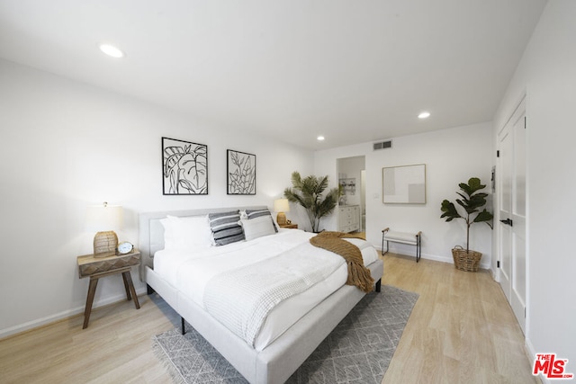 bedroom featuring light wood-type flooring