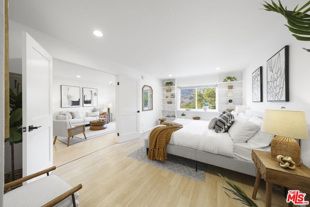 bedroom featuring light hardwood / wood-style flooring