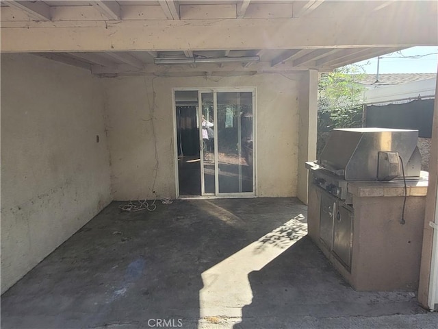 view of patio featuring exterior kitchen